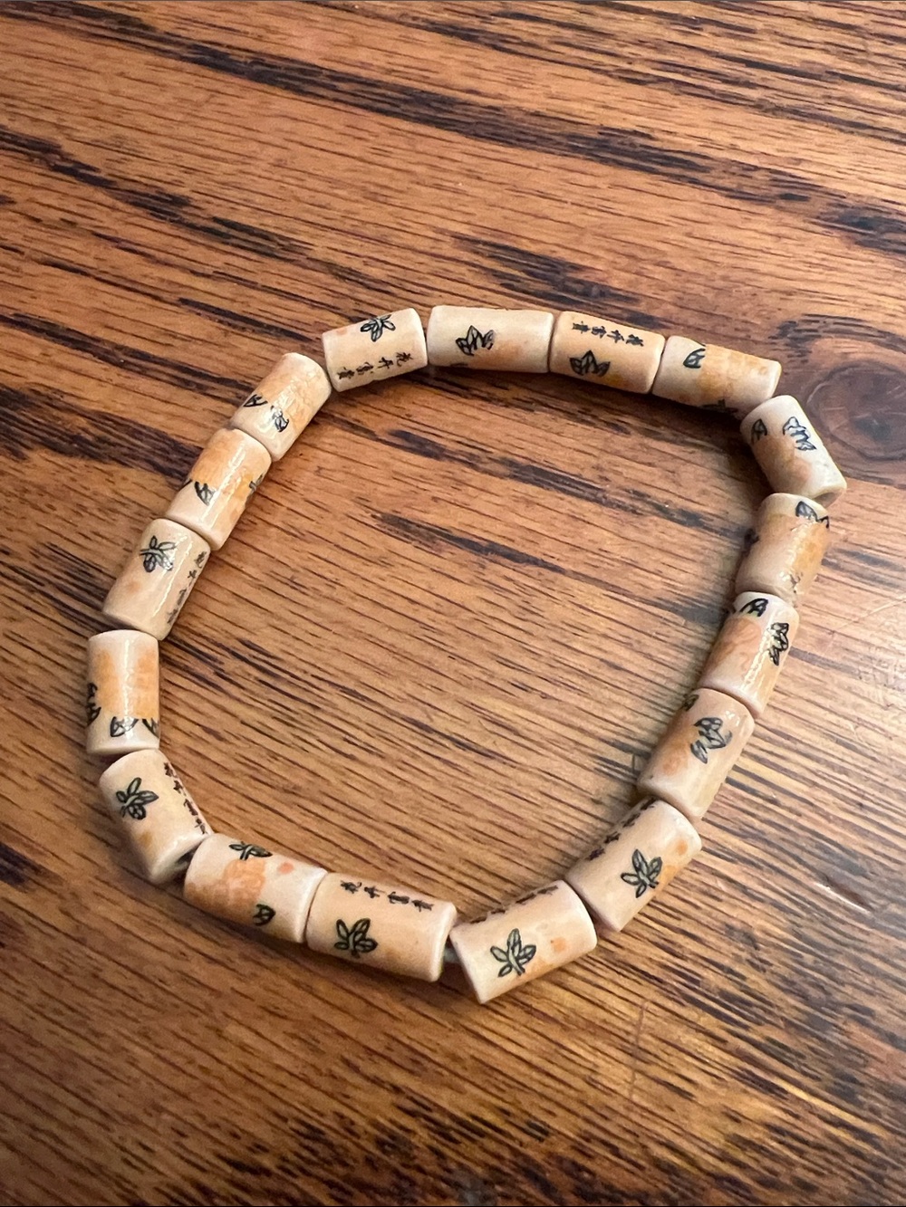 Beige Ceramic Beaded Bracelet with Black Japanese Chinese Words + Floral Motifs